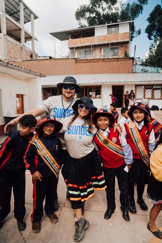 Reps posing with locals