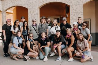 Group posing outside