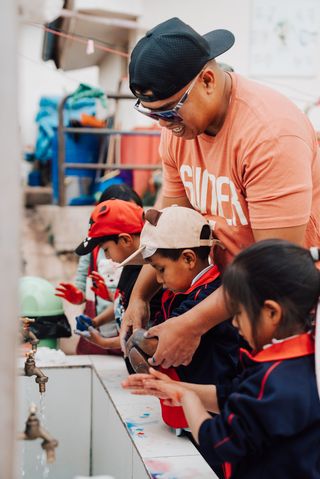 Rep helping school children